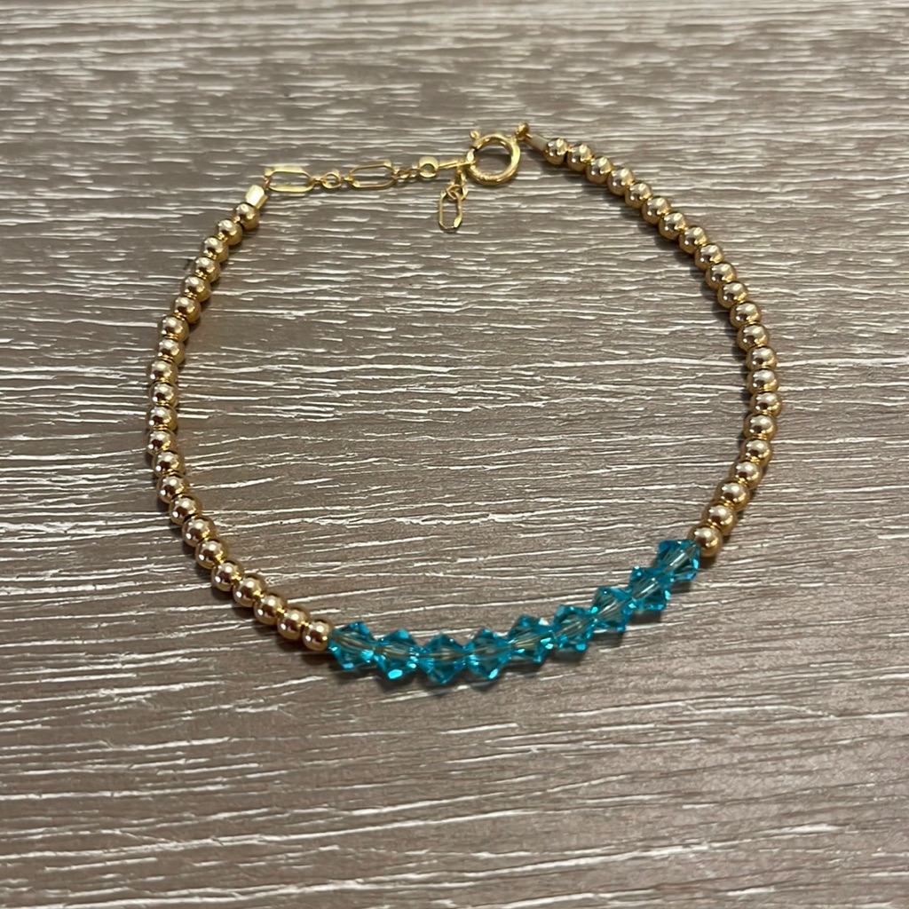 Gold Beaded Bracelet With Teal Gems